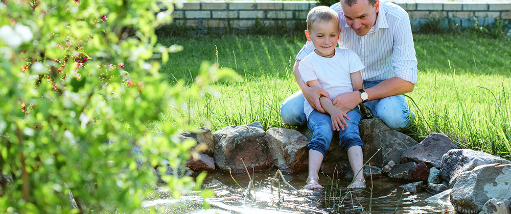 meyer-landscape-water-feature-dad-son-playing-in-pond