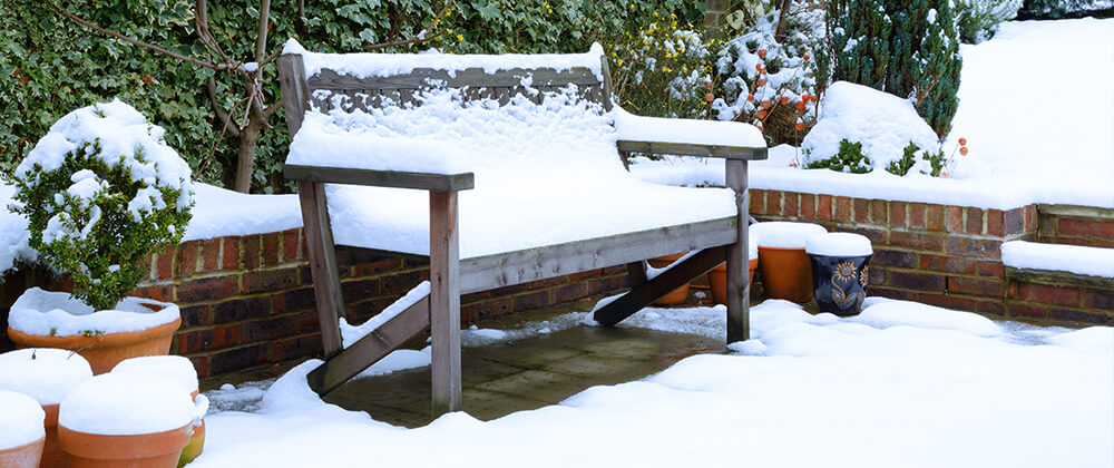 meyer-landscape-winter-patio-care-snow-on-bench