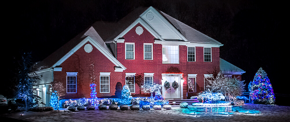 meyer-landscape-holiday-winter-lighting-brick-house-blue